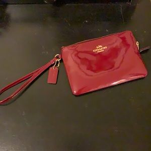 Burgundy Coach wristlet wallet. Barely used.
